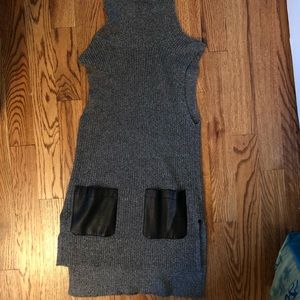 gray sweater vest, leather pockets